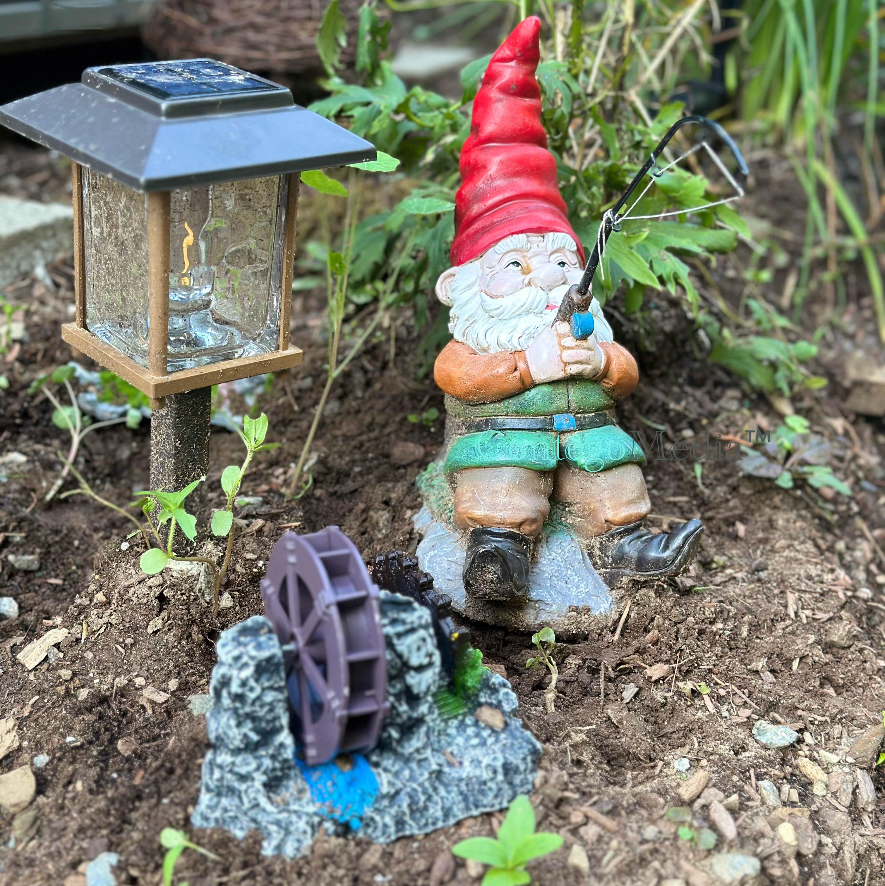 Og the Gnome - with waterwheel - Contego Media - contego.media