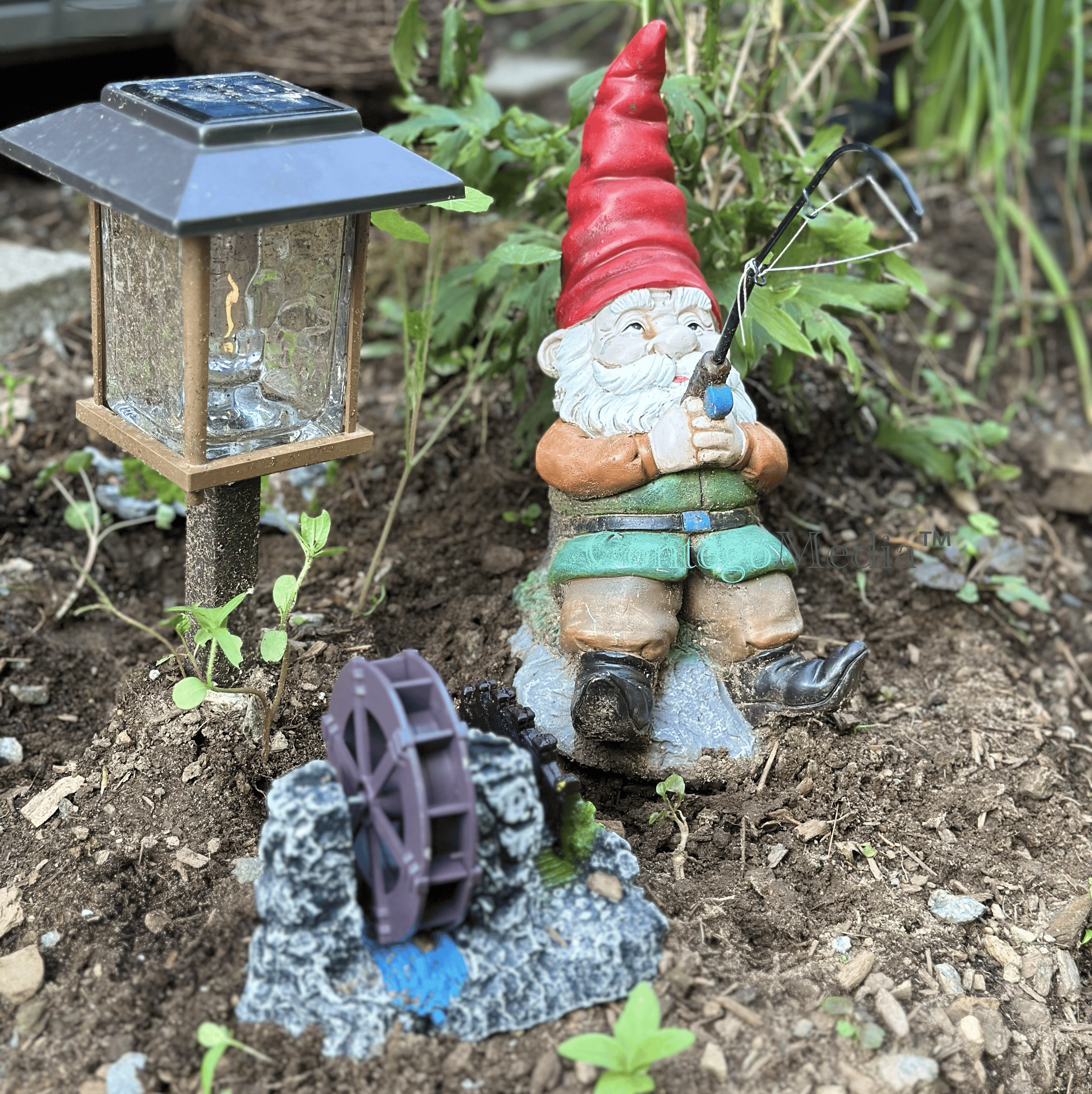 Melissa Movafaghi - Contego Media - Og the Gnome - with waterwheel - Photograph Credit Melissa Movafaghi